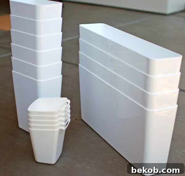 Use IKEA Organizers As Planters For A DIY Wood Slat Garden Wall, The Garden Glove Featured On Remodelaholic