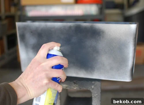 Spray Paint IKEA Kitchen Organizing Bins To Use As Outdoor Planters In A Wood Slat Garden Wall, The Garden Glove Featured On Remodelaholic