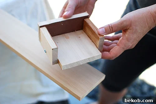 Diy Jig To Attach Wood Boards To A Cinder Block Fence For A Vertical Garden Planter Wall, The Garden Glove Featured On Remodelaholic