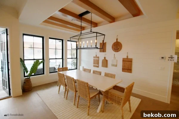 Neutral wicker dining chairs in a stylish dining room