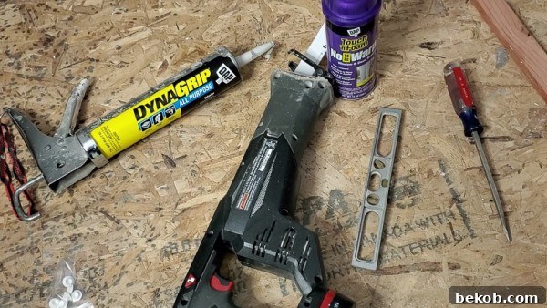 Materials for installing new window in basement bathroom, including DAP products