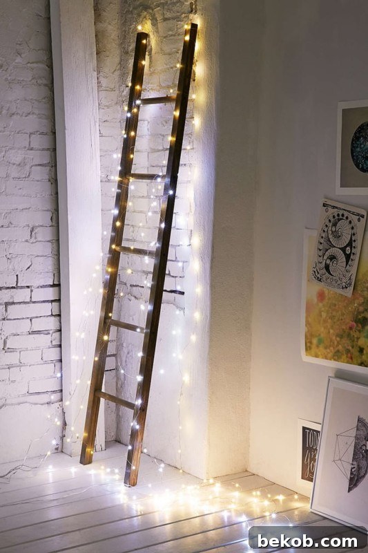 Wood Ladder Decor Idea With Lights For Nightlight Or Christmas, Via Urban Outfitters