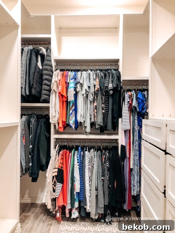 After photo of a custom closet renovation by Home Kimprovements, showcasing organized storage and modern farmhouse style.