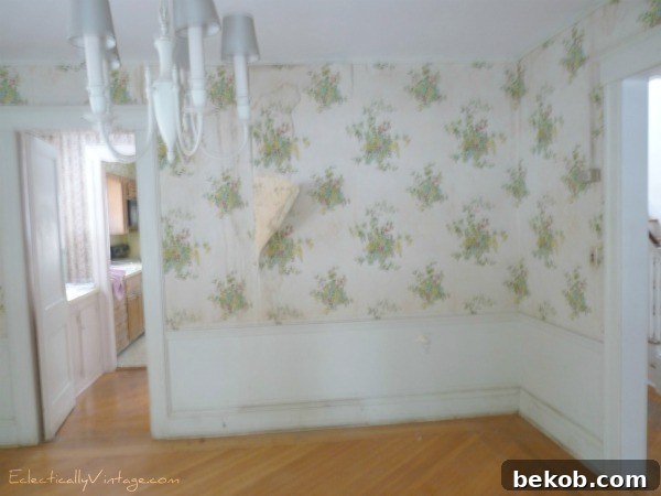 Original State of Dining Room - Dim Lighting and Outdated Decor