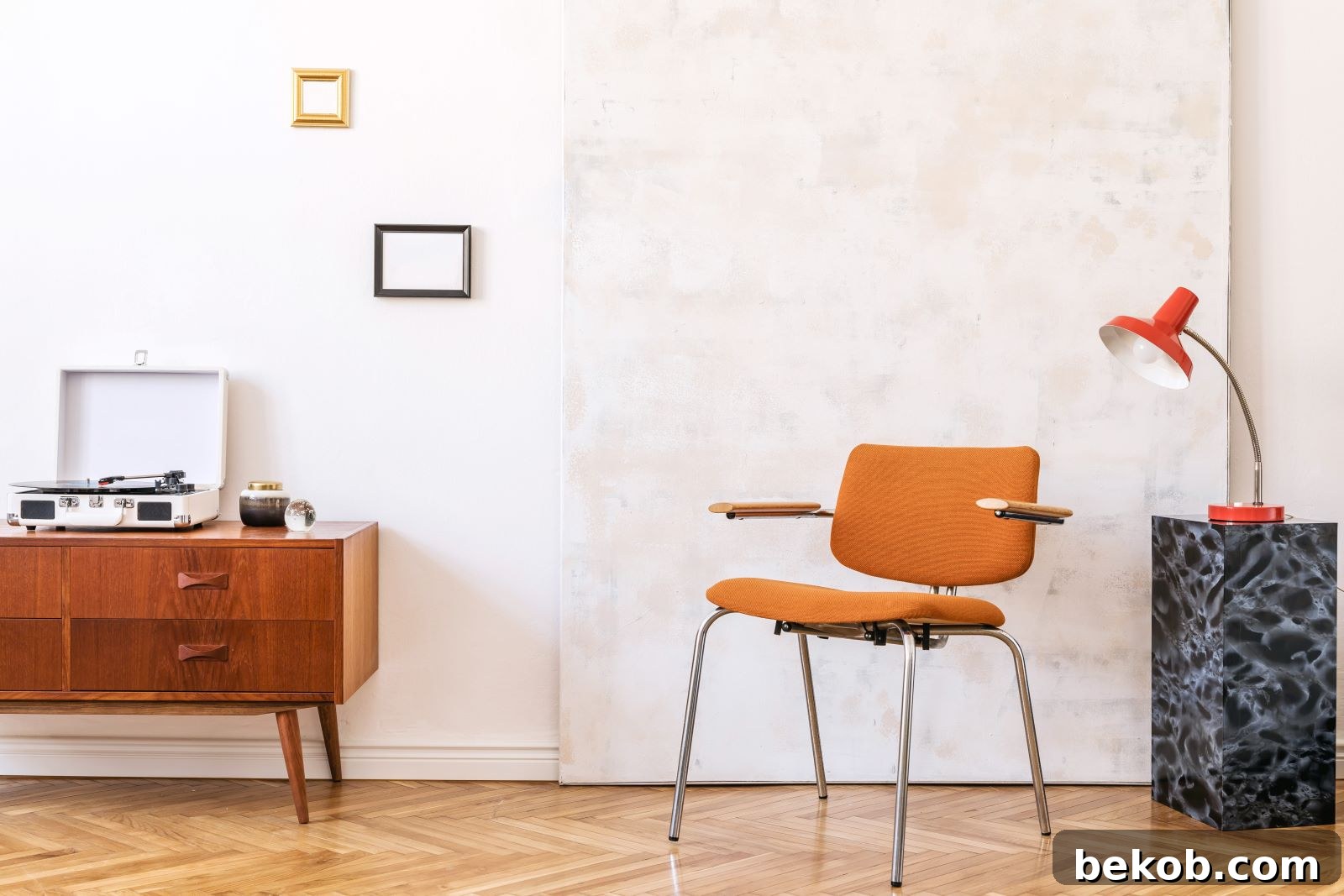 Modern armchair with slender, exposed legs in a light-filled living room, demonstrating how leggy furniture enhances perceived space and airiness.