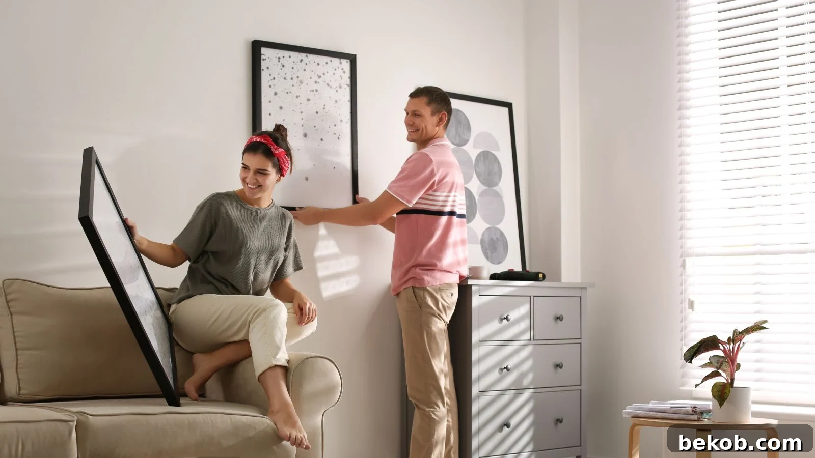 Couple Hanging Up Wall Art Shutterstock