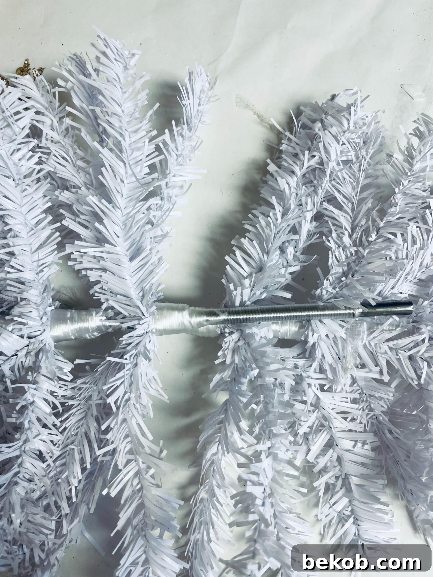 Dollar Tree DIY Christmas Swag for Front Door from Mini Christmas Trees, Remodelaholic