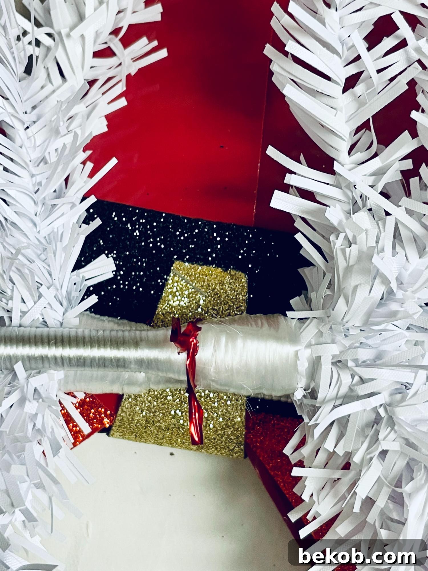 Dollar Tree DIY Christmas Swag for Front Door from Miniature White Christmas Trees, Remodelaholic