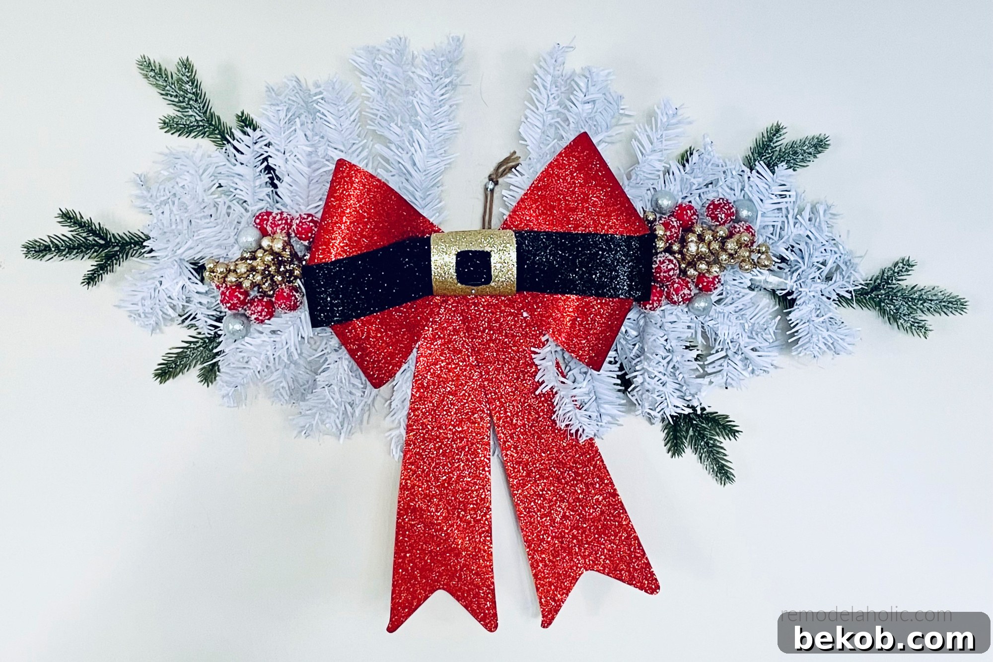 Dollar Tree DIY Christmas Swag from Miniature Christmas Trees, Remodelaholic