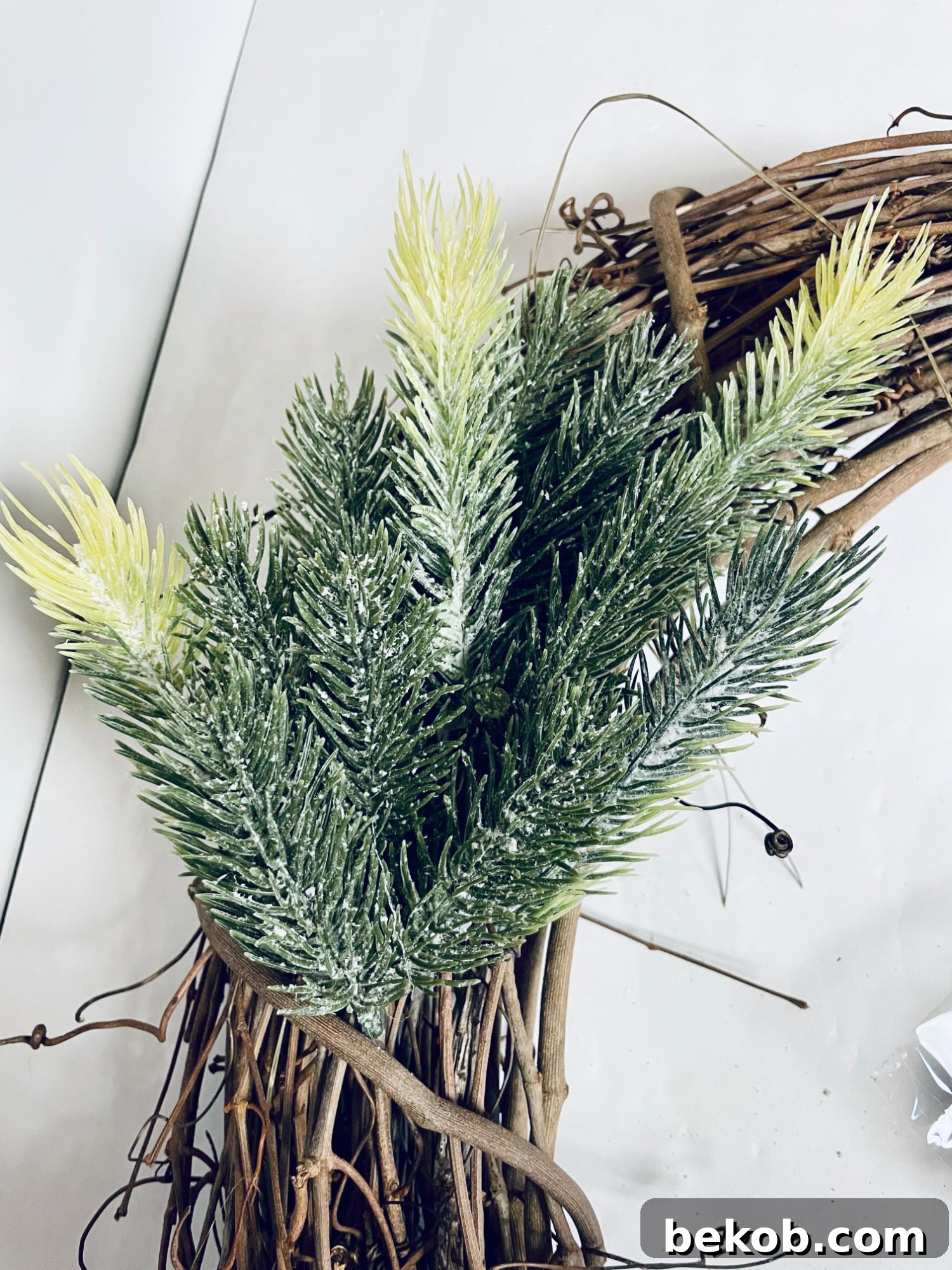 Affordable 30 Minute Dollar Tree Christmas Wreath 7 Simple DIY Dollar Tree Christmas Wreath Tutorial, Glue Pine Picks 2 Remodelaholic (4)
