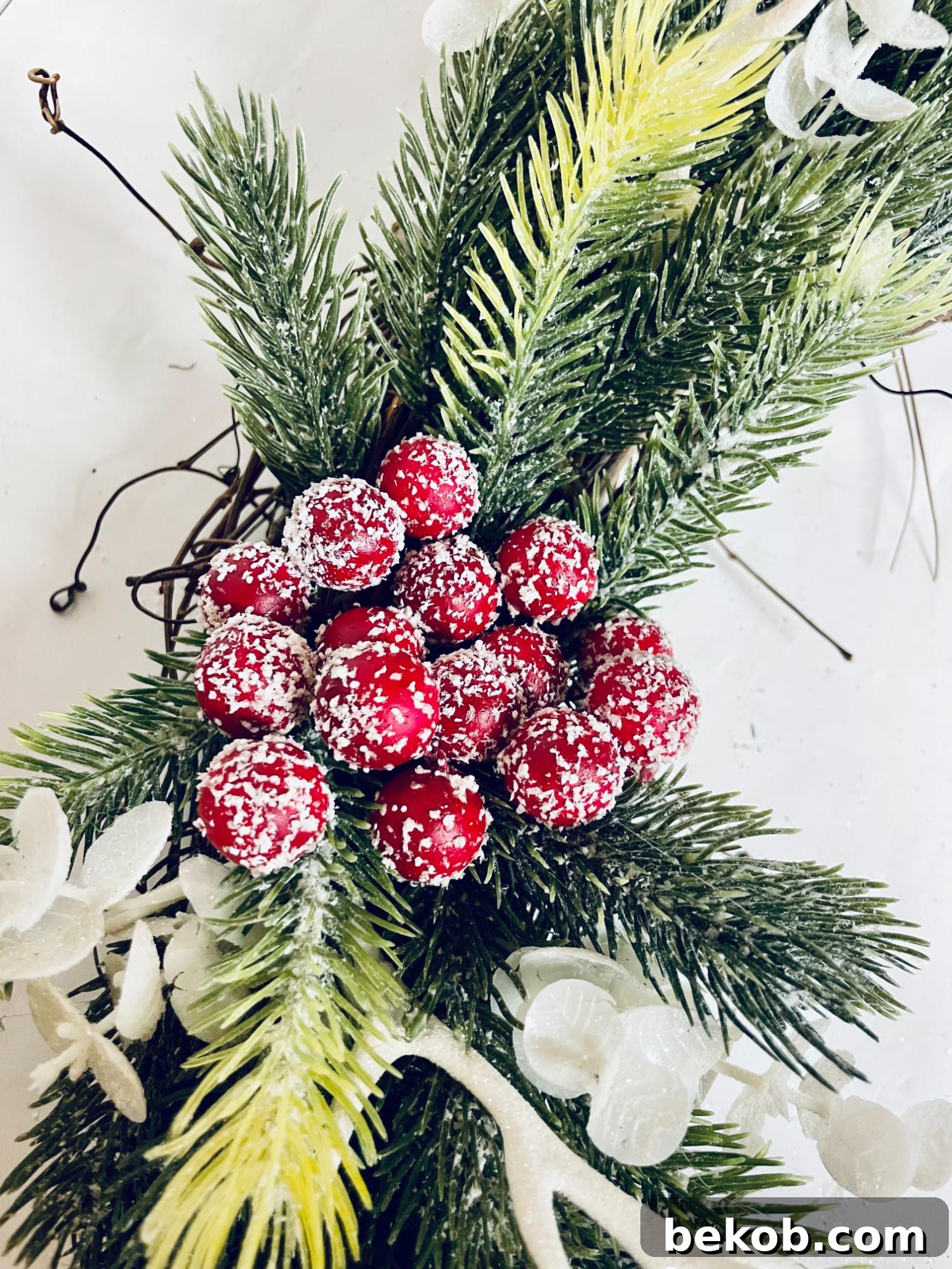 Affordable 30 Minute Dollar Tree Christmas Wreath 11 Simple DIY Dollar Tree Christmas Wreath Tutorial, Add Red Berries Cluster, Remodelaholic