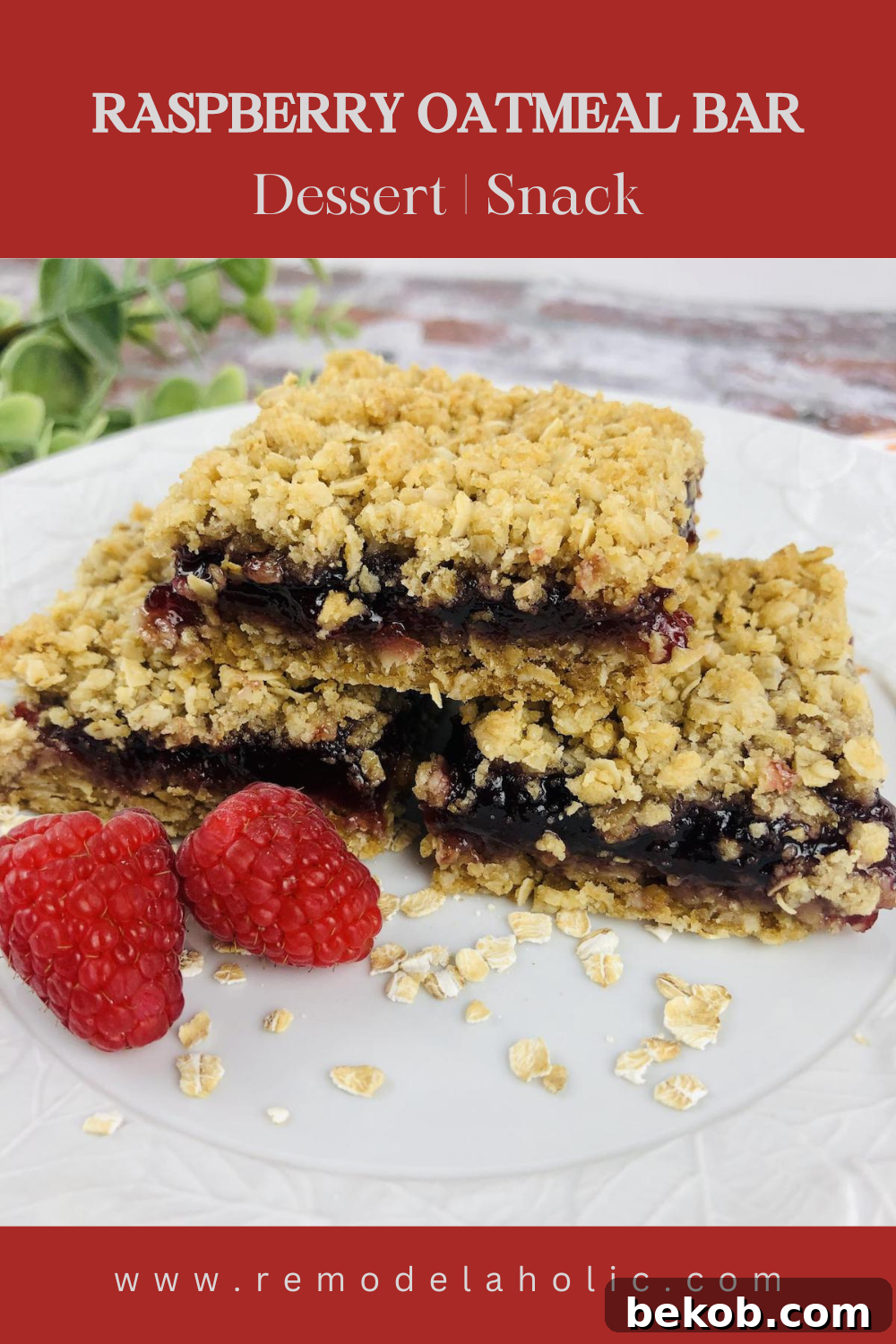 A stack of beautifully cut Raspberry Oatmeal Bars, ready to be served.
