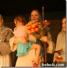 Daughter presenting roses