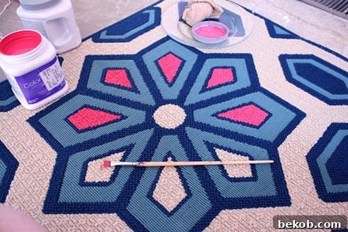 Close Up Painting the Rug