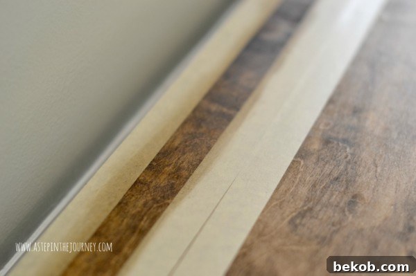 Creating striped stained faux butcher block kitchen island buffet countertop using tape