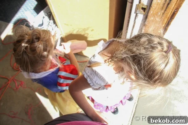 Children Eagerly Awaiting New Patio