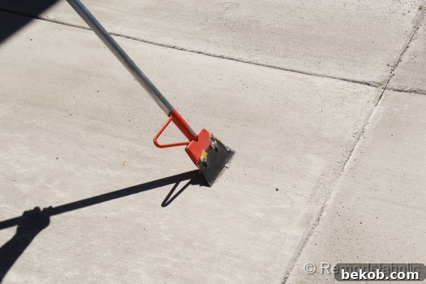 Scraping the Concrete Patio Surface
