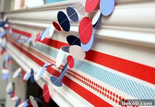 Festive Seasonal Washi Tape Mantel Decor by 52 Mantels, showing a fireplace mantel decorated with tape
