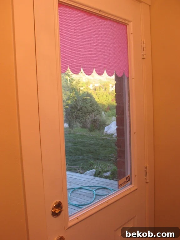 DIY Decorative Window Awning/Privacy Screen with Washi Tape by Mindy Mae’s Market, showing tape used for a window design