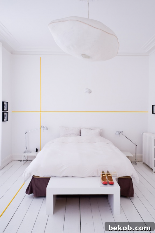 Elegant Simple Stripe Graphic Washi Tape Wall via Remodelista, featuring a single, clean stripe