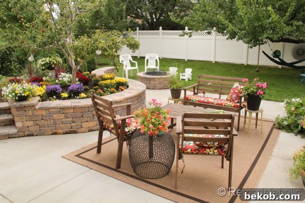 Detailed view of the colorful mums and pansies in the fall garden, thriving in their new environment