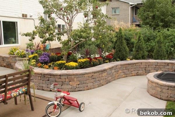 The charming fall garden with a rustic element, possibly a decorative pot or garden feature