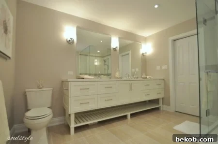 Elegant neutral bath renovation