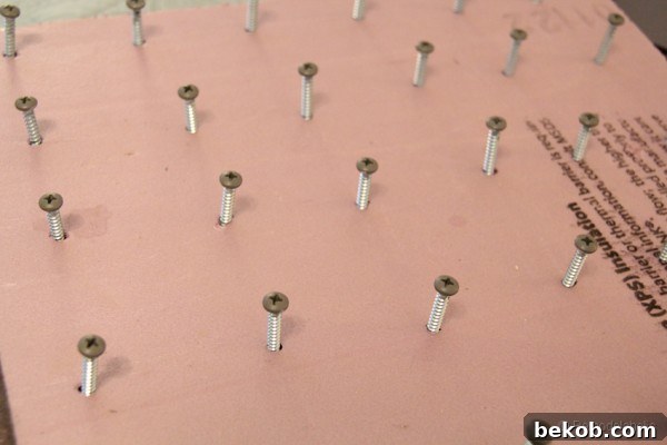 Painting Screw Heads to Match Rustic Shelf Brackets