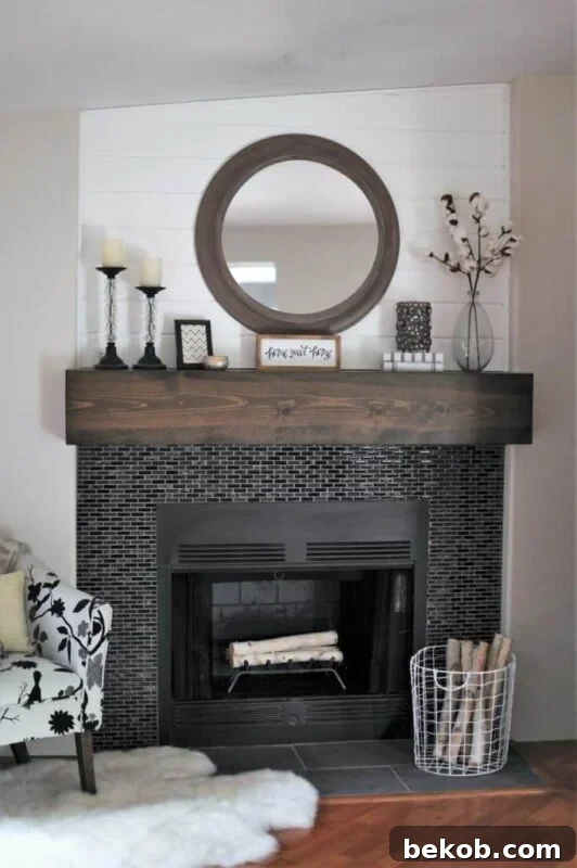 Dark Tile and Wood Mantel Fireplace Remodel by Joyful Derivatives