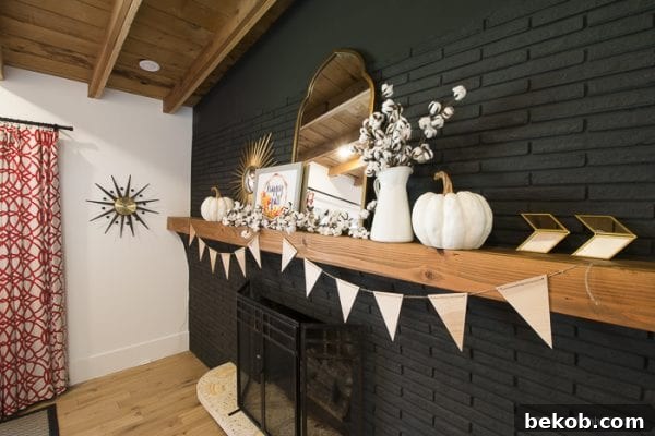 Fall Mantel Decor on Black Painted Brick Fireplace with Shaw Floors