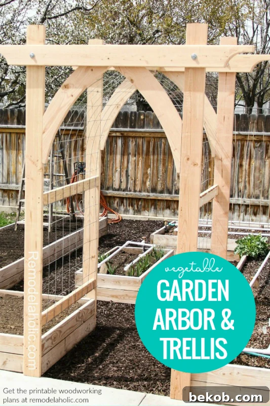 Build A Wooden Arched Garden Arbor Vegetable Trellis #remodelaholic