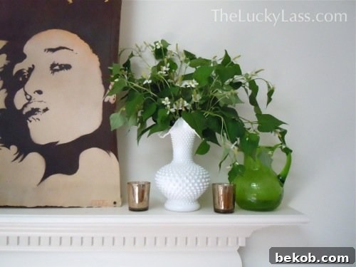 16 Inspiring Summer Makeovers for Your Home and Garden 8 Elegant Garden Flower Mantel Arrangement for Indoor Summer Decor