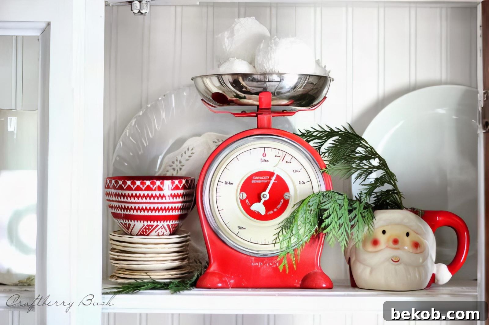 Use Evergreen And Red To Decorate A Hutch For Christmas Craftberry Bush Via @Remodelaholic1 600x399 032953