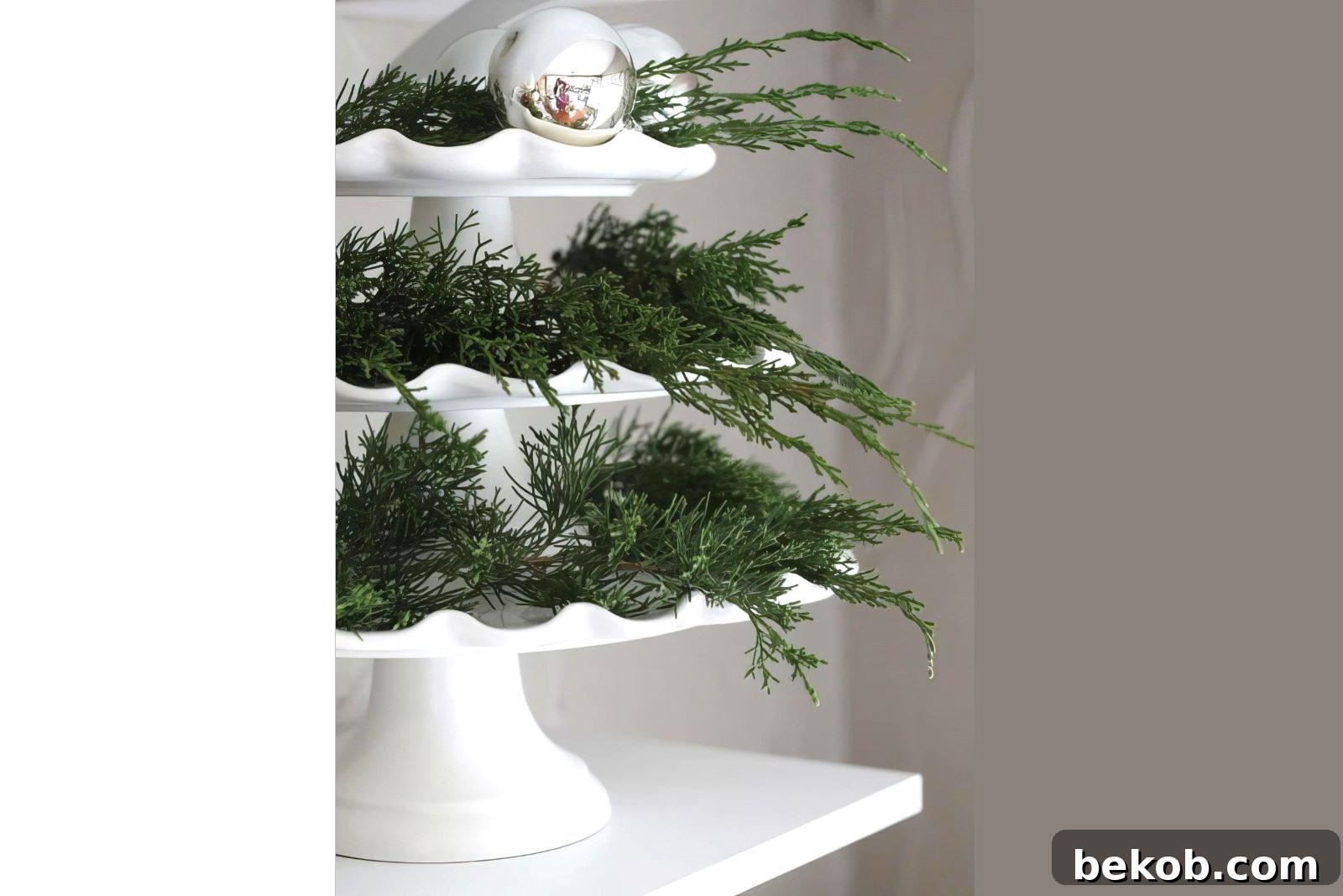 Fresh Fir And Pine Branches On A Cake Plate Dish 12th And White Via @Remodelaholic 