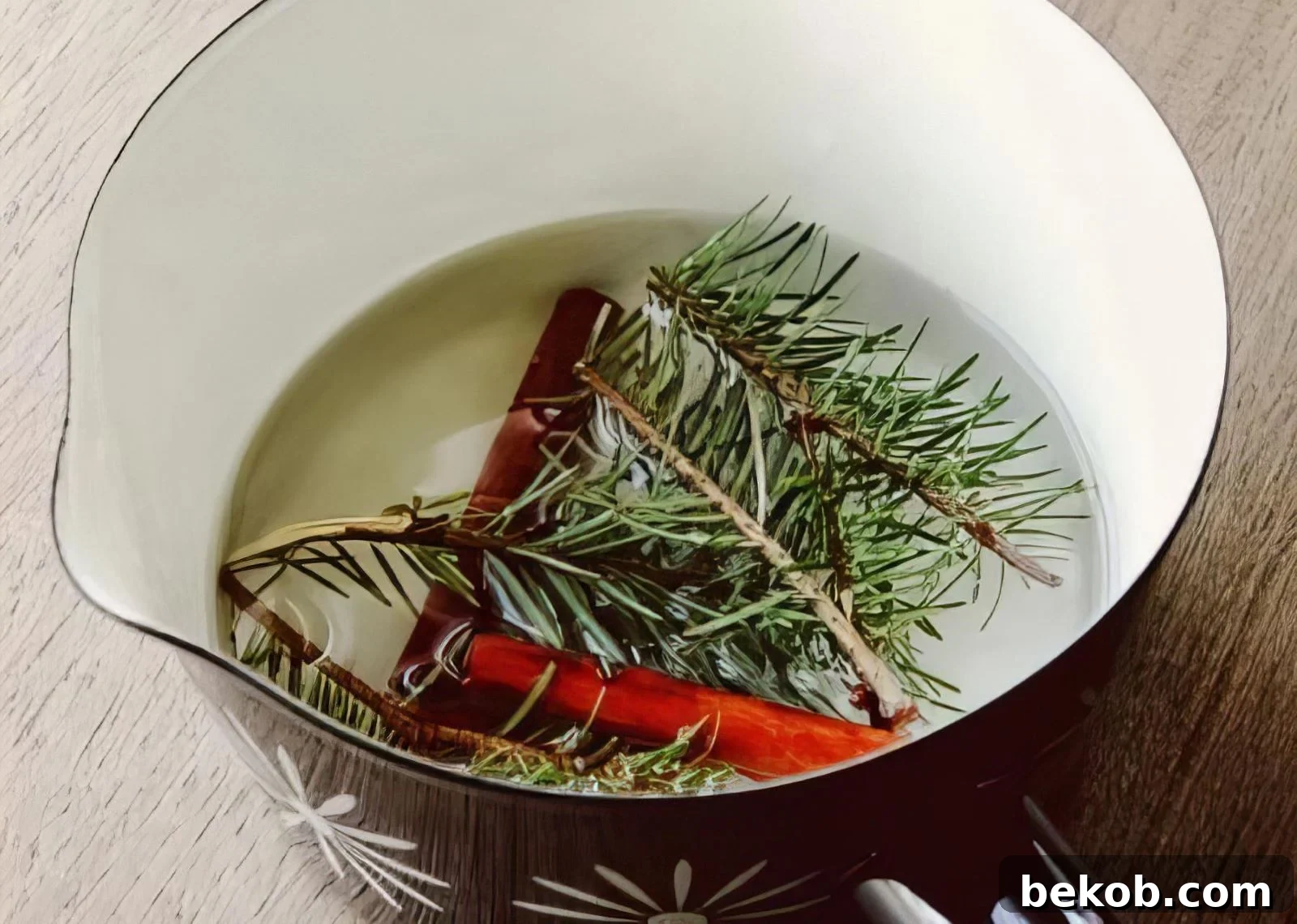 Simmer Pine Needles And Cinnamon For A Christmas Scented Air Freshener Make Haus Via @Remodelaholic 450x450 033003