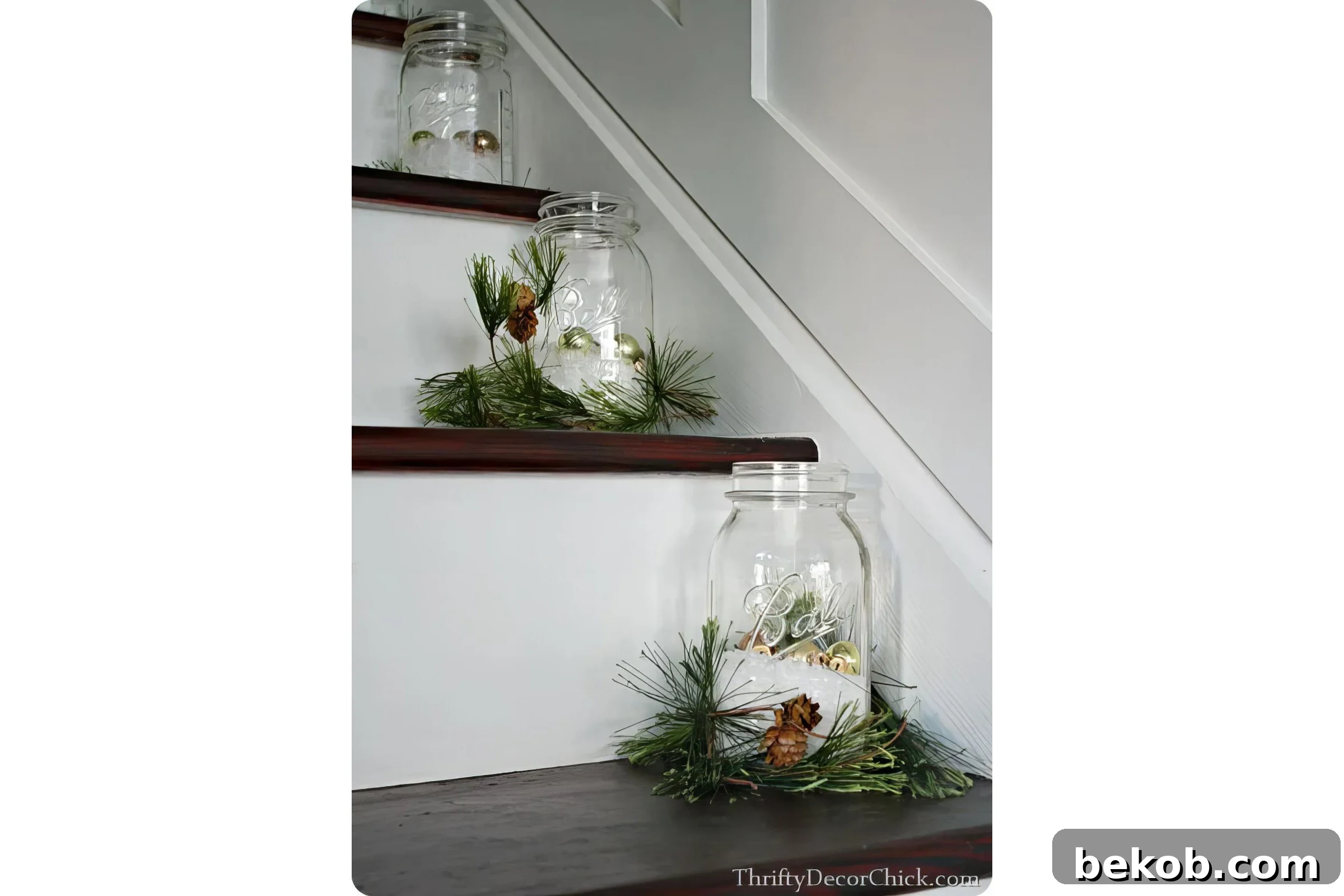 Use Evergreen Springs And Mason Jars To Decorate The Stairs For Christmas Thrifty Decor Chick Via @Remodelaholic 033007 Copy
