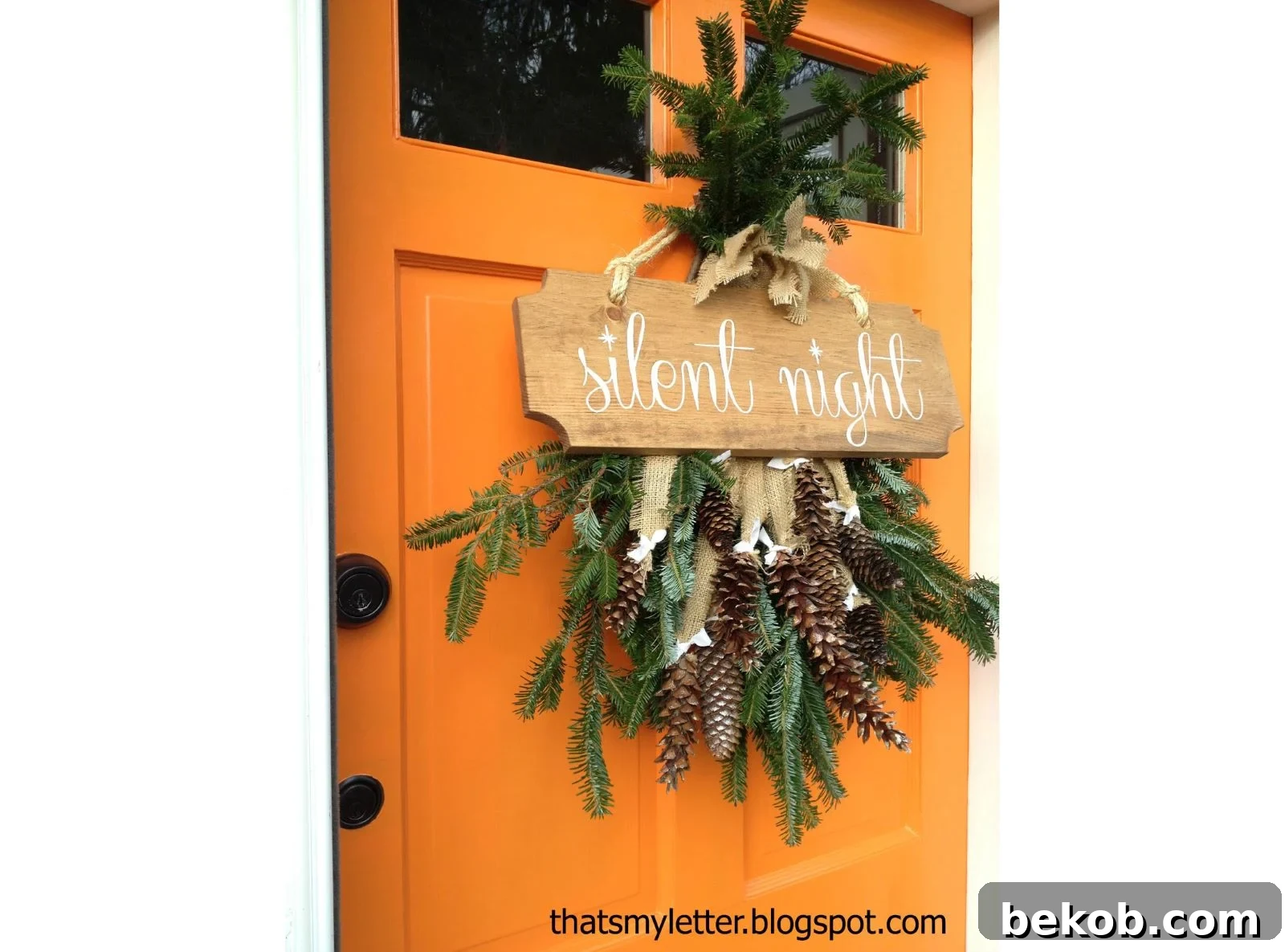 Silent Night Sign On A Pine Swag Front Door
