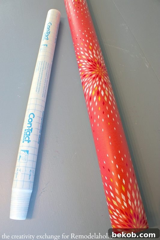 Make drawer liners by covering wrapping paper with clear contact paper. Remodelaholic