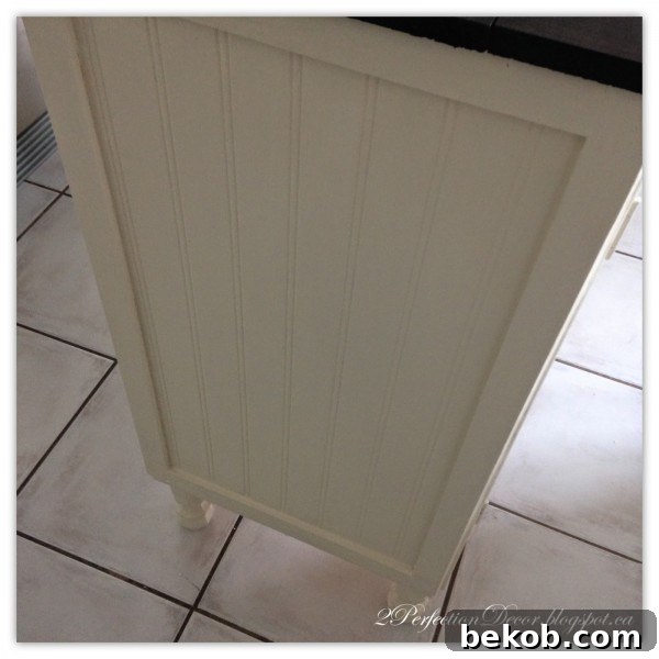 Beadboard Elegance: A Gorgeous Vintage Desk Becomes a Stunning Kitchen Island by 2Perfection Decor