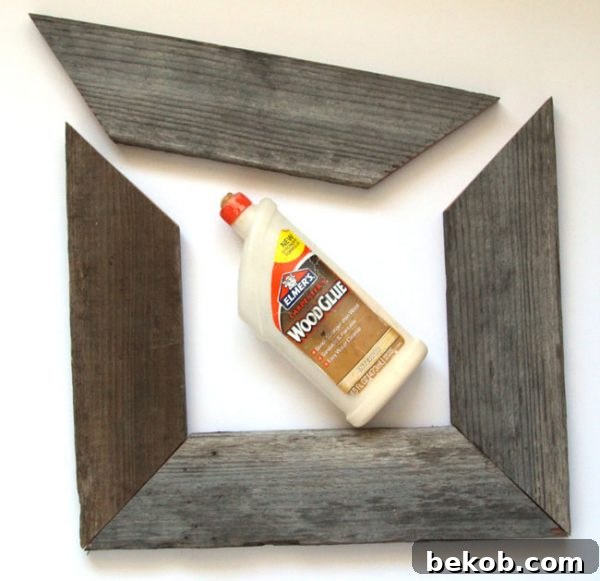 Assembling the barn wood frame with glue