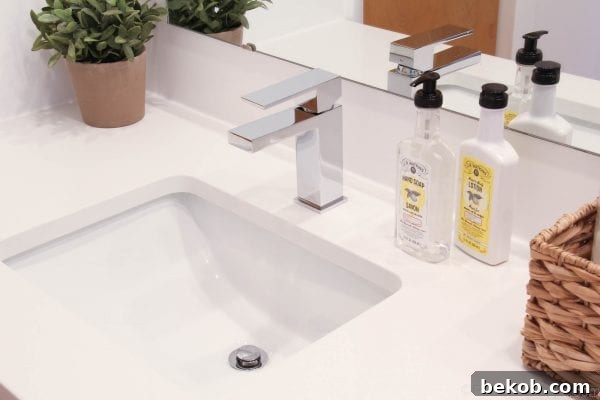 Bathroom decor with small plant and white aesthetic