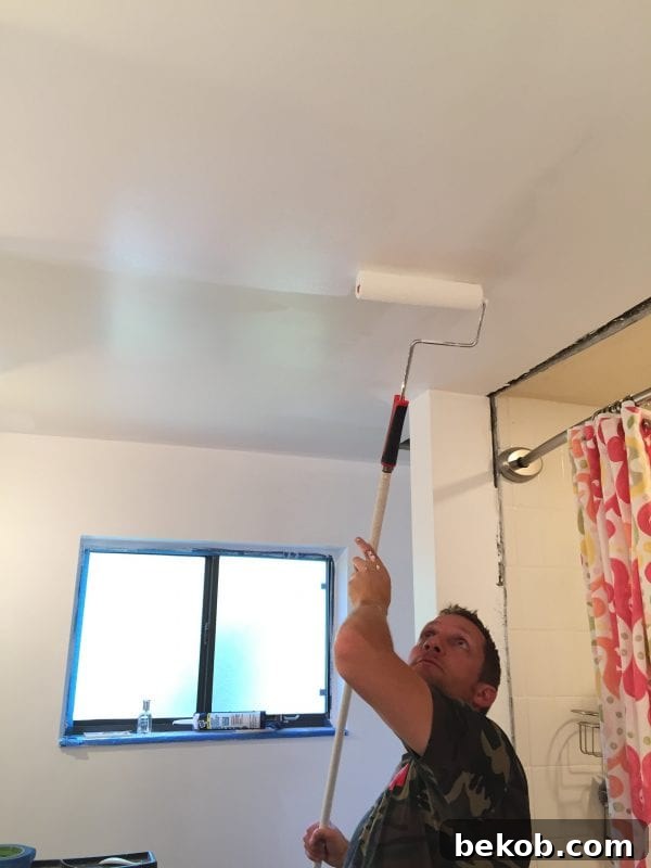 Freshly painted bathroom walls after plaster repair