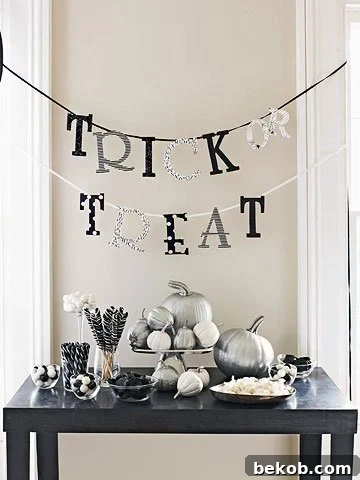 Stunning Pumpkin Centerpieces: Elevate Your Fall Table 16 Silver and black pumpkins