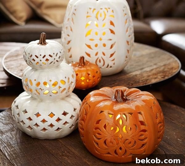 Stunning Pumpkin Centerpieces: Elevate Your Fall Table 4 Filigree ceramic pumpkins from Pottery Barn