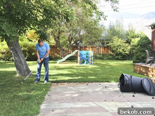 Two people enjoying walnut golfing in the backyard