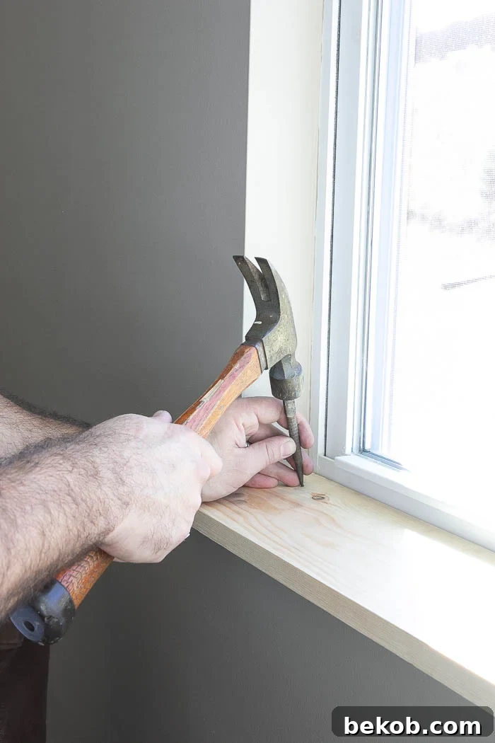 Installing the sill on the window