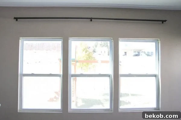 Before: A plain window awaiting the Craftsman trim upgrade