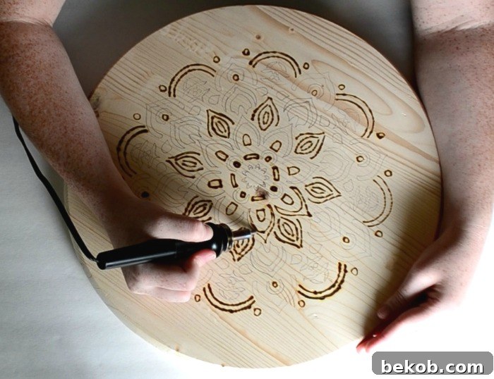 Using quick motions with the wood burner utensil