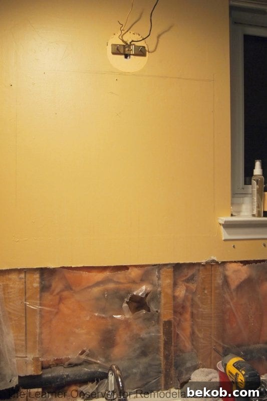 Installing a Flush-Mount Medicine Cabinet 3 Cutting wall studs for recessed medicine cabinet installation