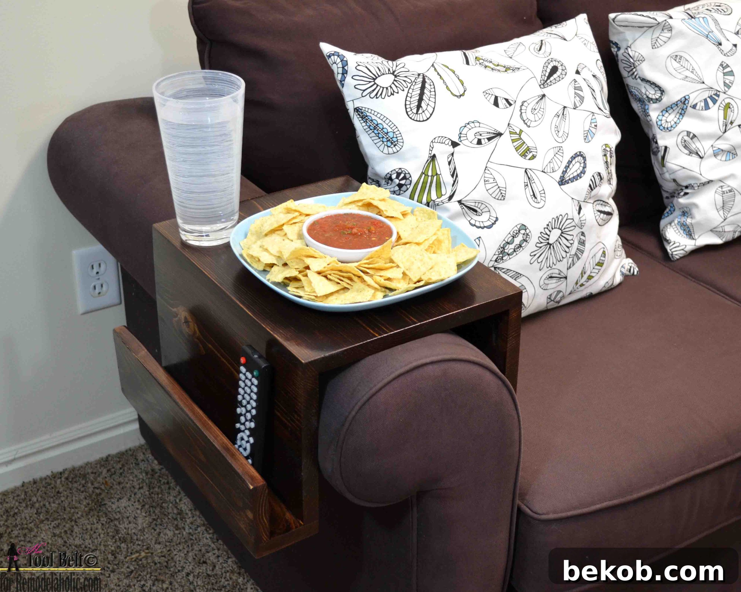 Innovative DIY sofa arm table providing a convenient surface for drinks and remotes.